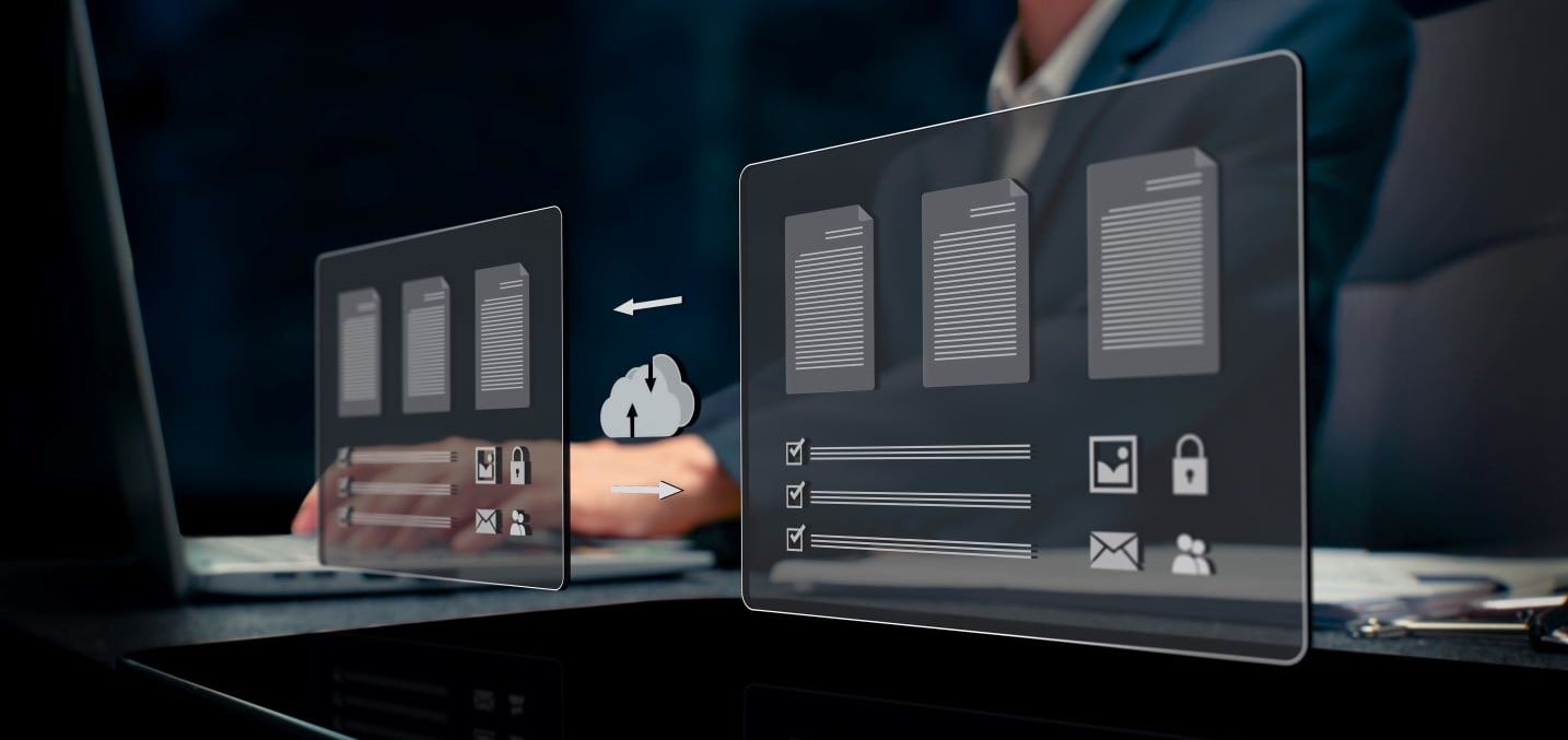 Businessman transferring backup business data to the cloud