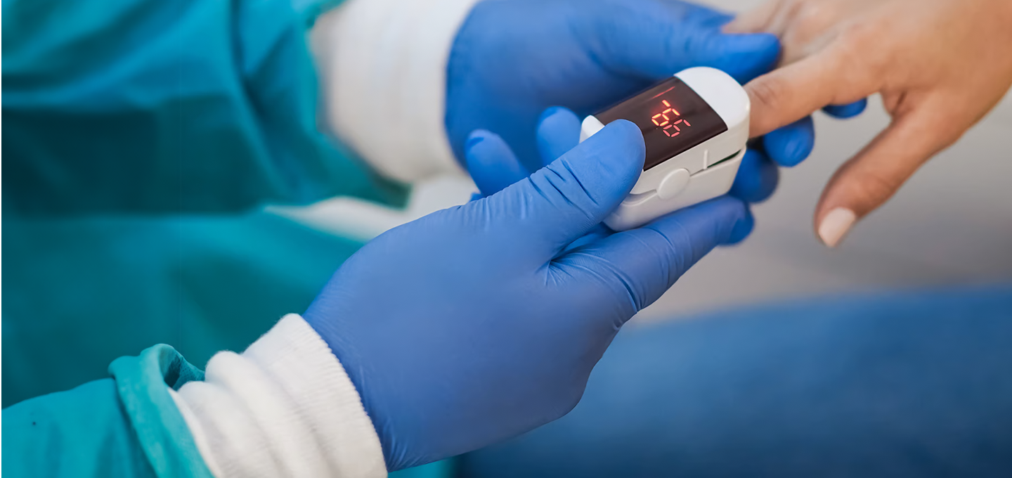 doctor taking patients blood pressure