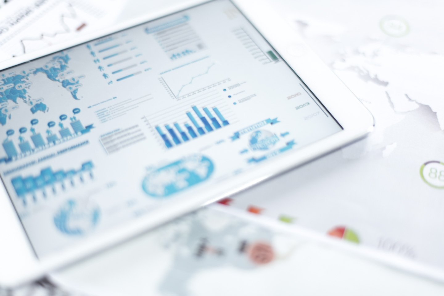 A variety of tablet screens with digital dashboards