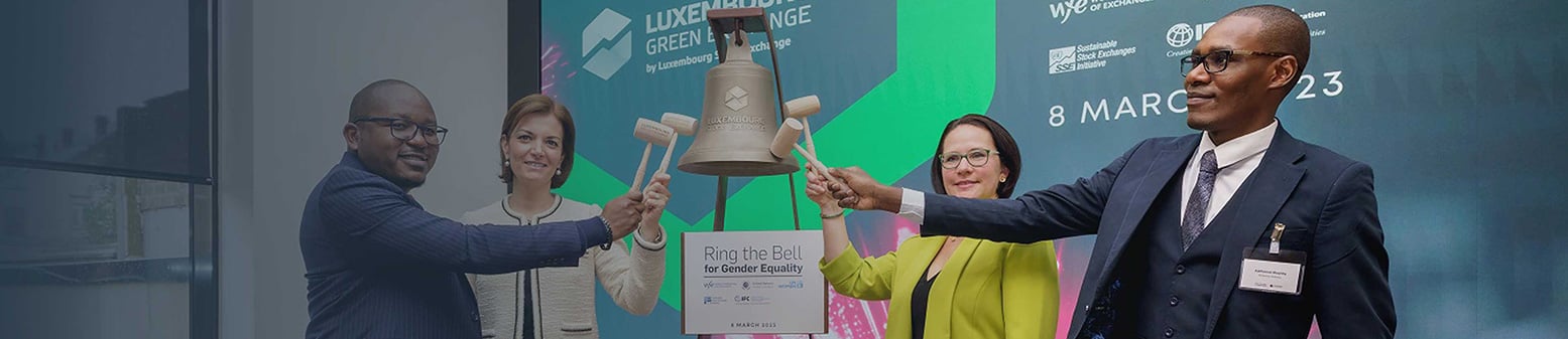 Group of people ringing the bell for gender bond