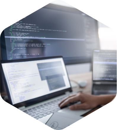 Person working on several screens