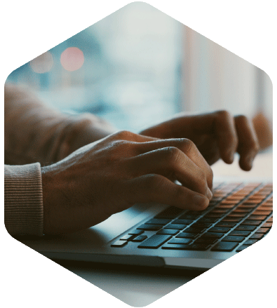 Image of a men working and touching on laptop computer touchpad