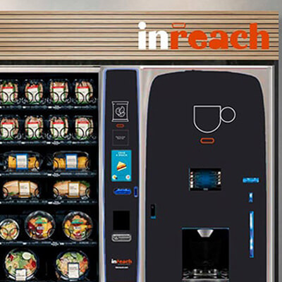 Vending machines displaying packaged meals and a coffee dispenser under the Inreach brand.