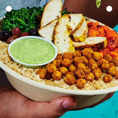 A bowl filled with a colorful assortment of food items
