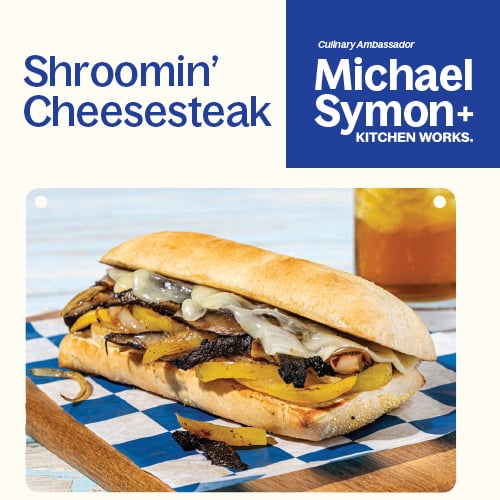 A sandwich placed on a piece of paper, showcasing its layers and ingredients.