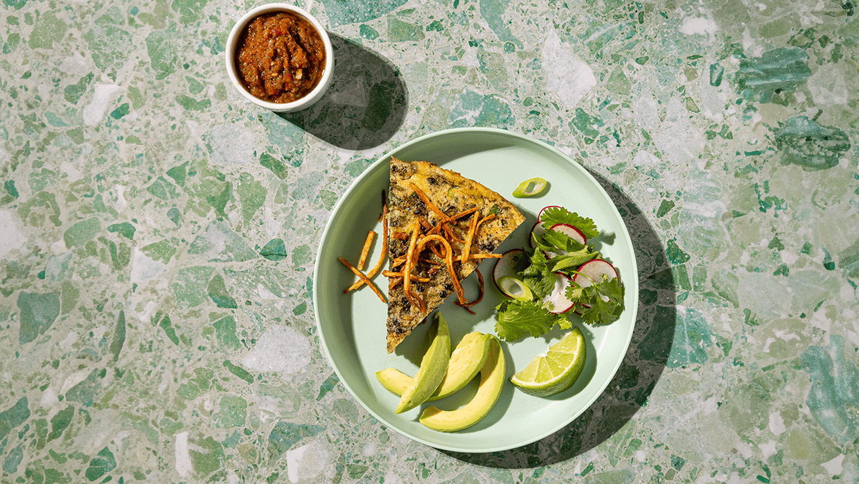 green dish with Black Lentil Frittata Cilantro Salad 