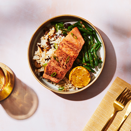 dish served with salmon and vegetables