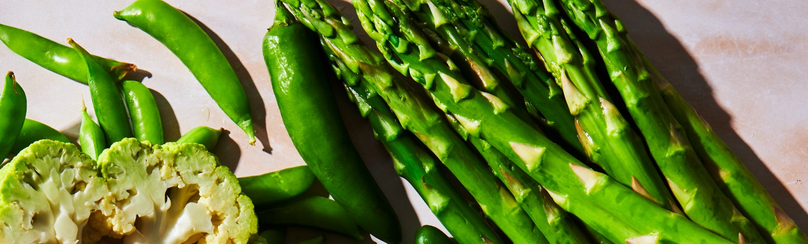 green asparagus, peas and spring vegetables