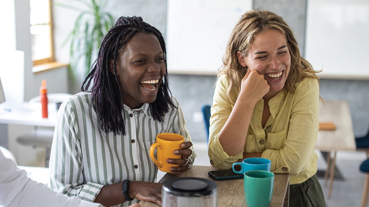 two women laughing