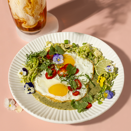 delicious dish of crispy curry egg brussels slaw