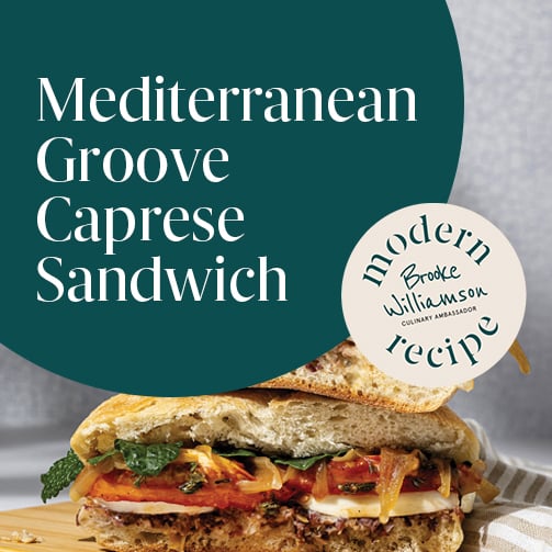 Graphic reading “Mediterranean Groove Caprese Sandwich” over stacked caprese sandwich with mozzarella and veggies