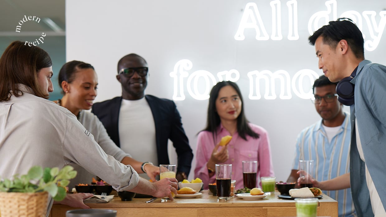 diverse group enjoying food together