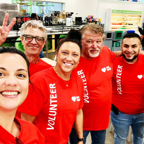 Volunteer t-shirt featuring a logo and slogan promoting community service and engagement.