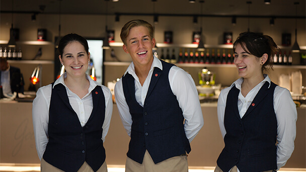 group of waitress smiling