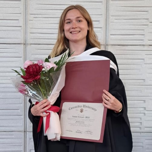 Woman smiling and taking her degree