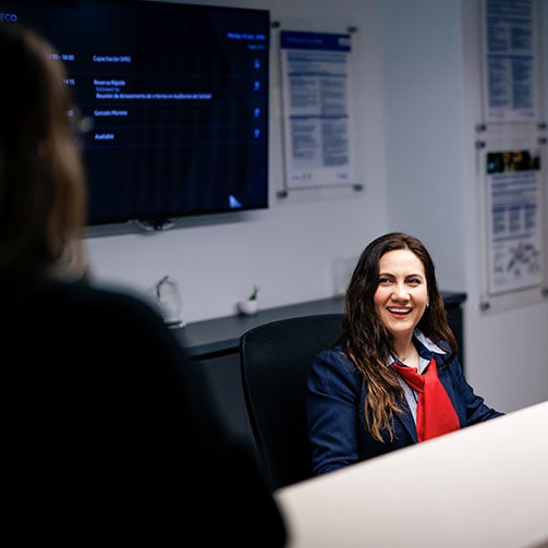 Smiling woman in Sodexo uniform