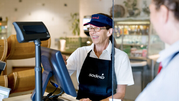 female cashier serving