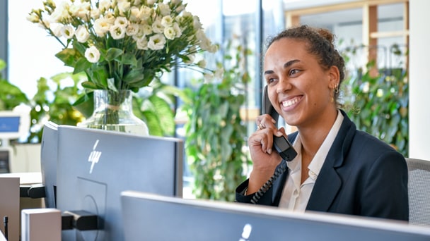 Smiling woman working in office