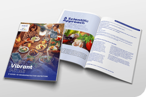 Image of two booklets, one closed and one open. The closed booklet's cover features colorful dishes with the title 'The Vibrant Mind: A Guide to Neuroprotective Nutrition.' The open booklet displays text and images related to a scientific approach to neuroprotective nutrition.