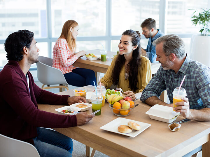 people gathered eating