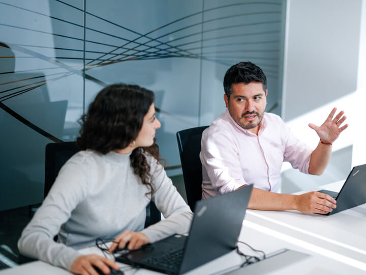coworkers in meeting room