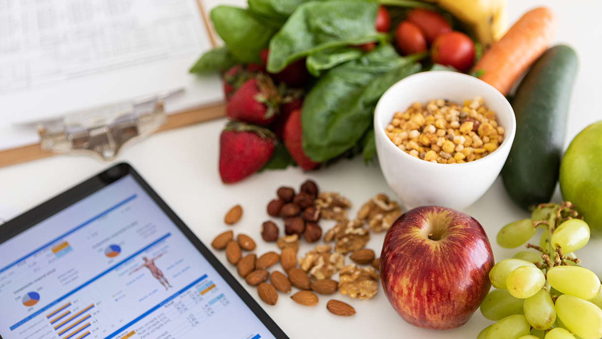 healthy food beside a laptop