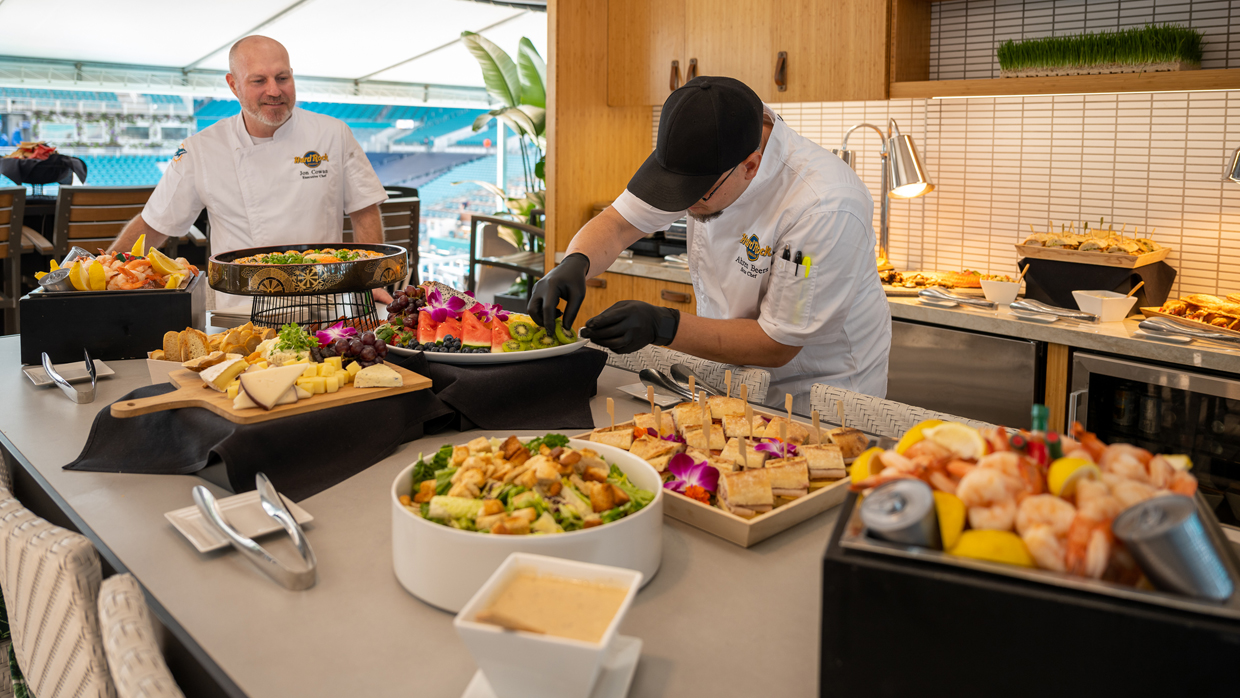 two chefs preparing delicious food