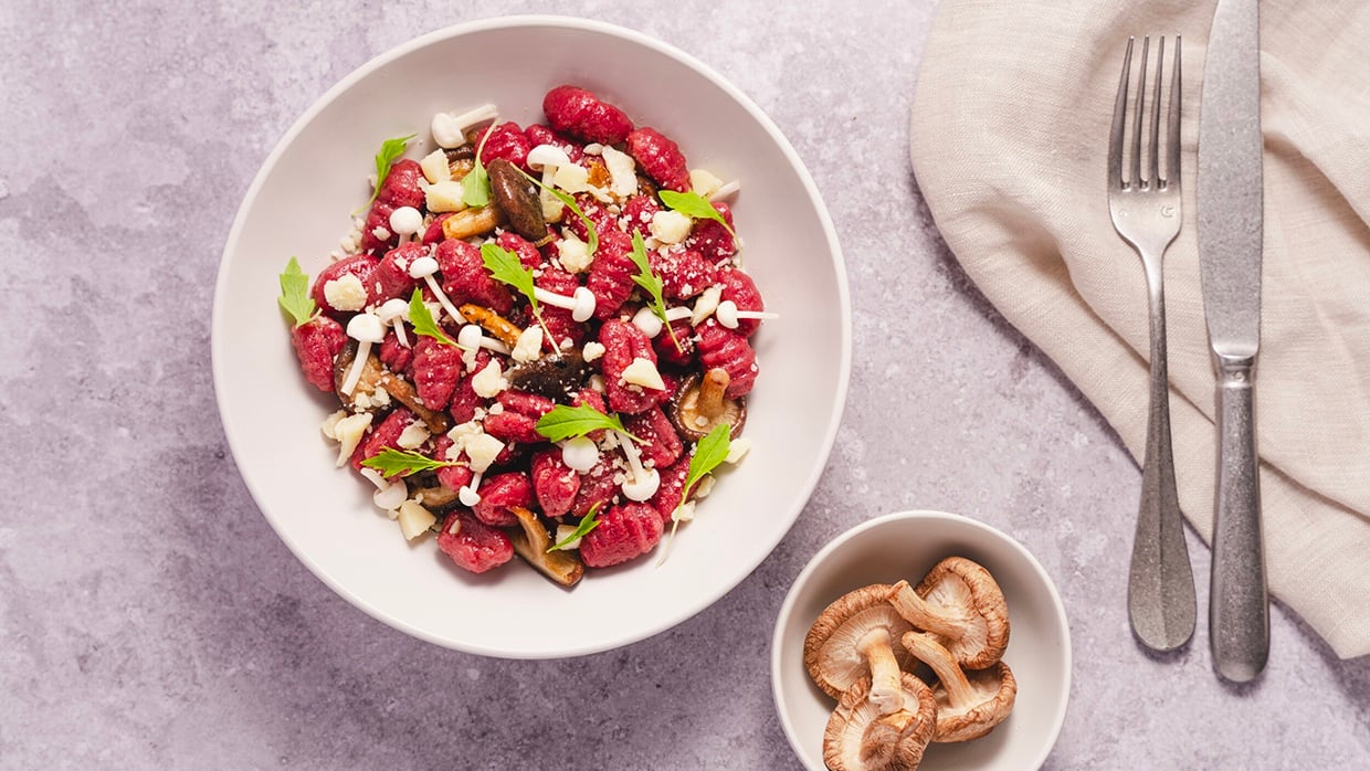 Fresh and delicious food on a plate accompanied by mushrooms