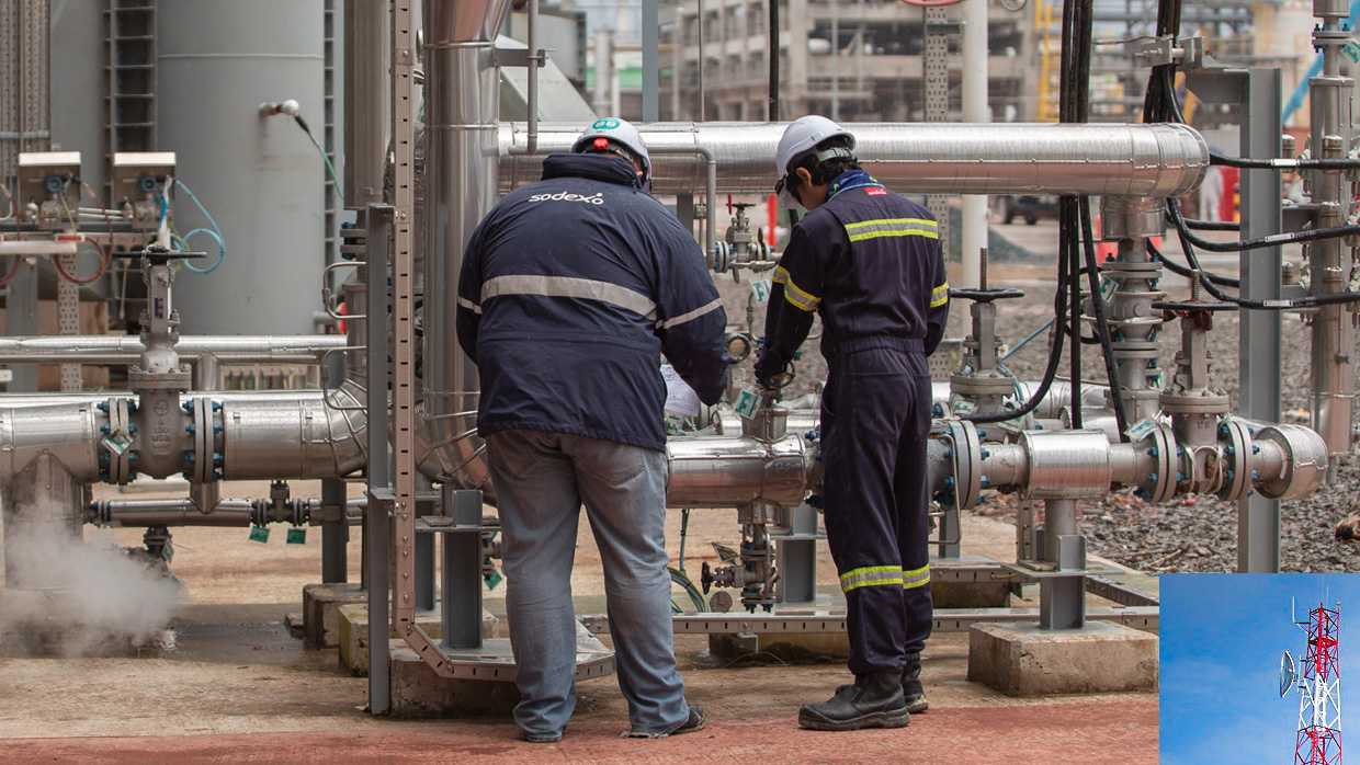 two workers fixing some pipeline