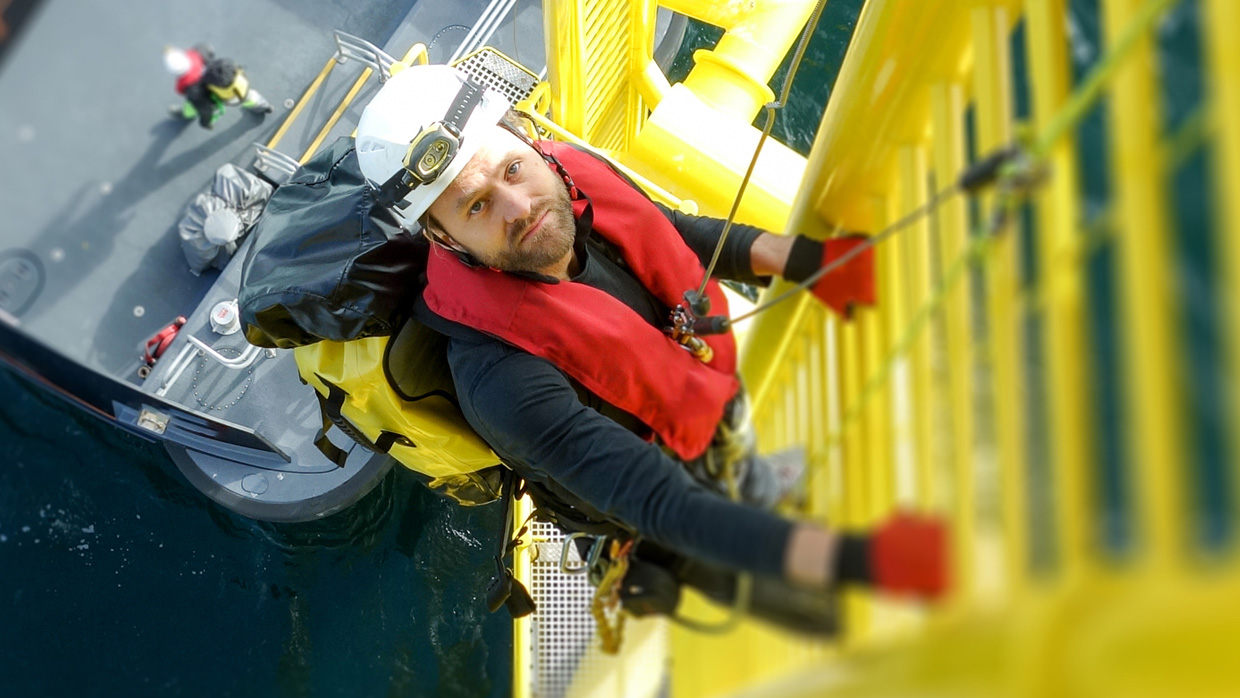 A worker climbing with a stairs
