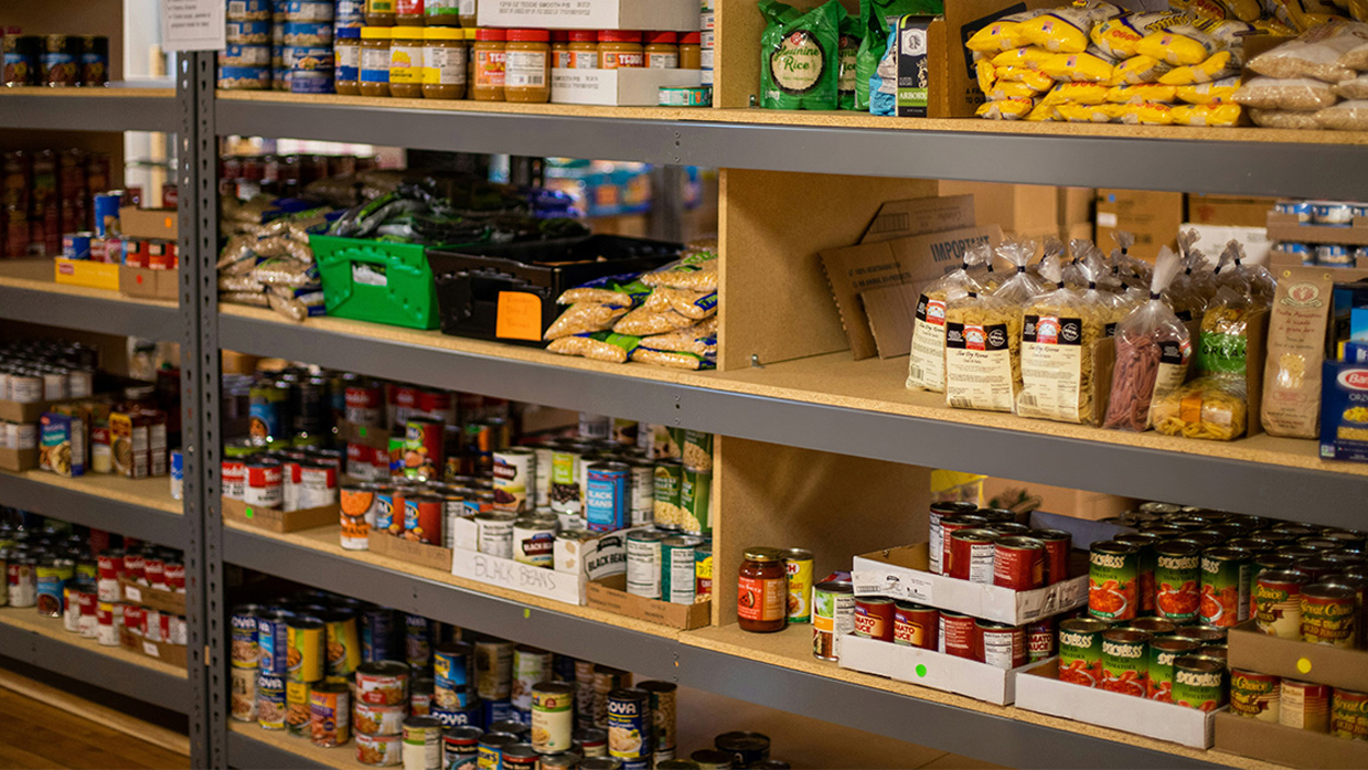 Shelves stocked with non-perishable grocery staples