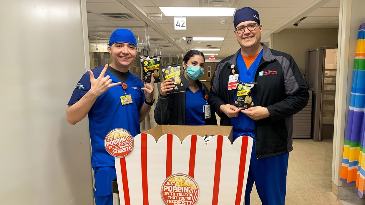 Caregivers at Rio Grande Regional Hospital enjoying popcorn snacks
