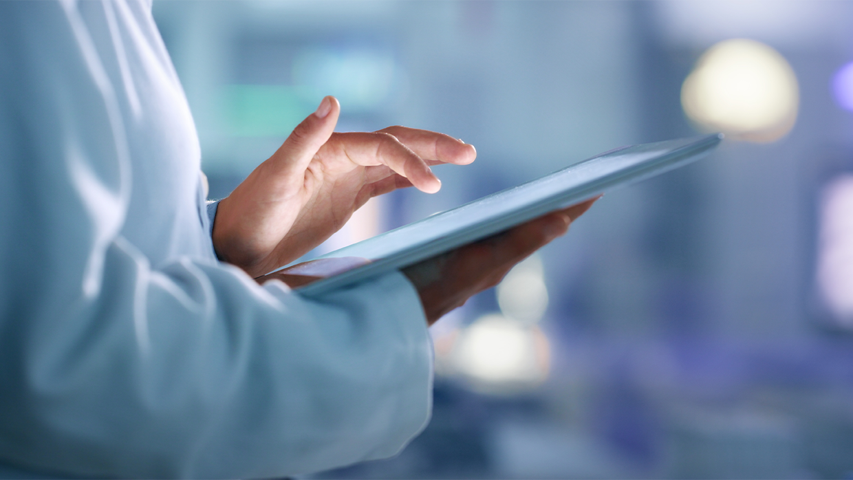 doctor using a tablet device