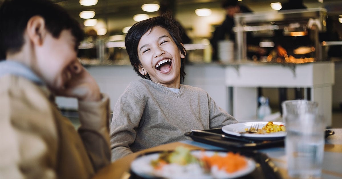 Group of Student at lunch showing excitement.