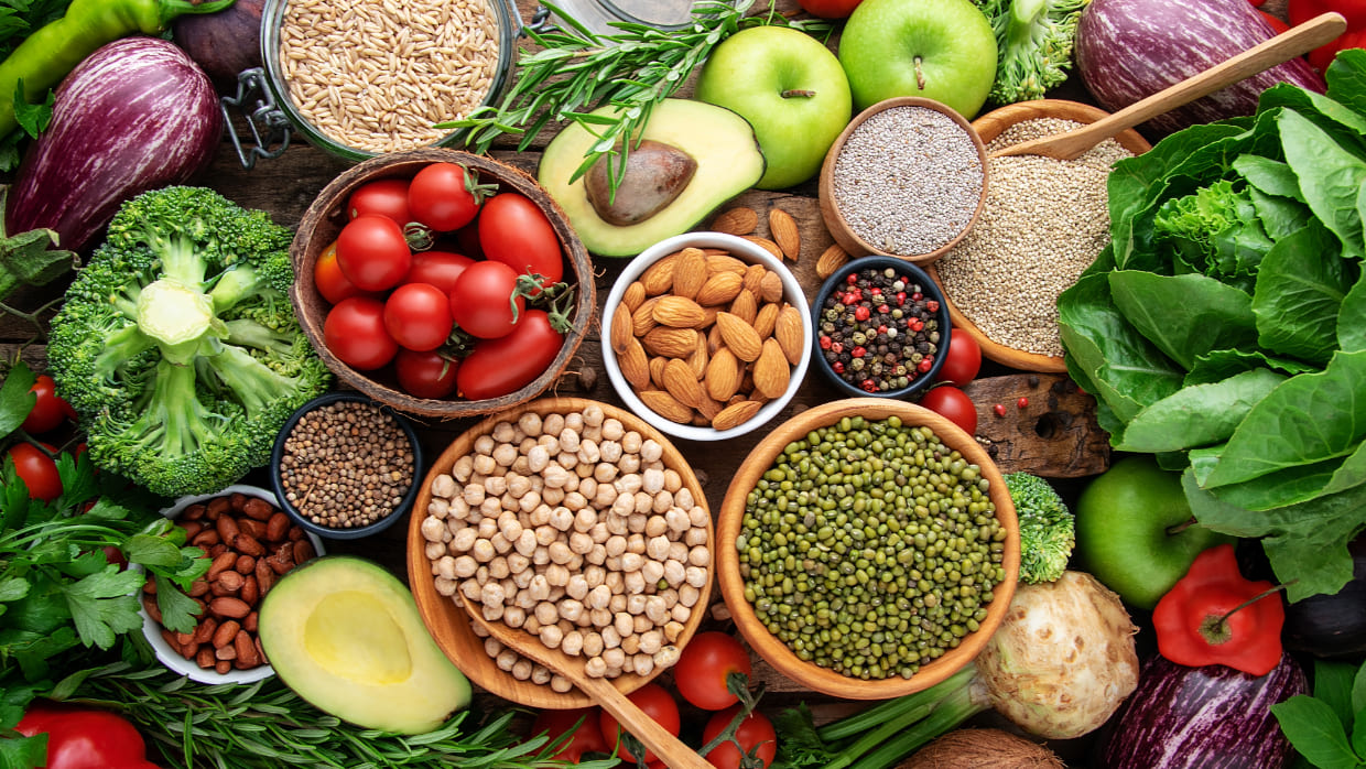 A vibrant assortment of vegetables, fruits, grains and nuts.