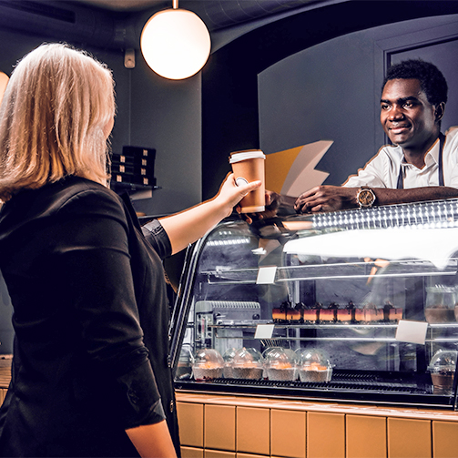 barista serving coffee