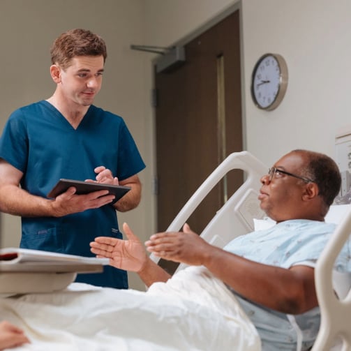Nurse conducting a bedside round