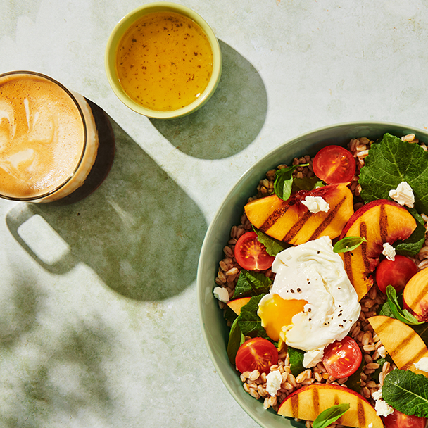 plate of salad with some coffee
