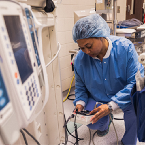 female staff preparing clinic machines