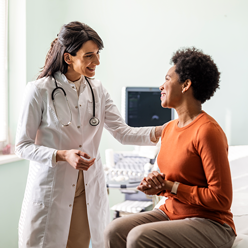 female doctor attending female patient