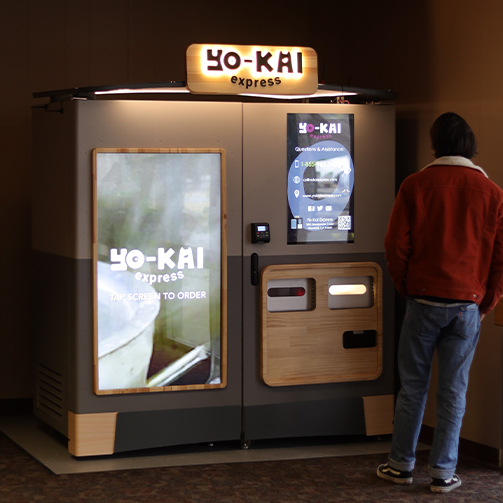 man using a vending machine