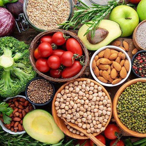A vibrant assortment of vegetables, fruits, grains and nuts.