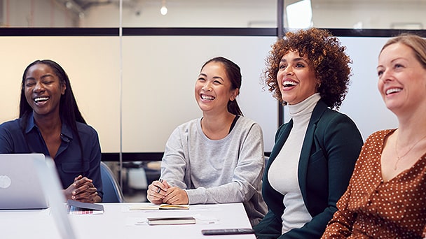 women looking something and smiling