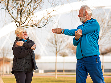 Old man selecting an old woman