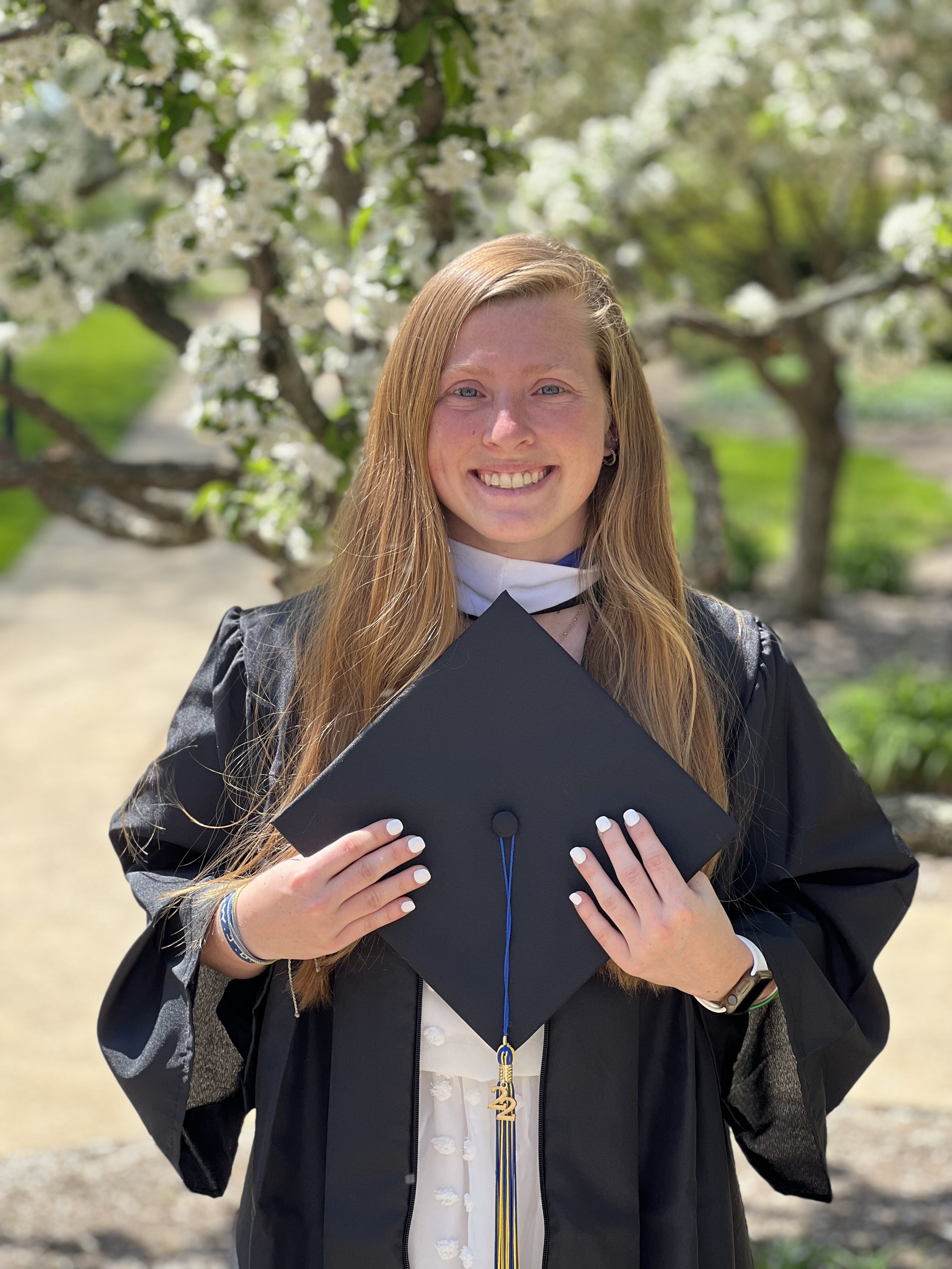 Happy female college graduate