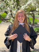 Happy female college graduate
