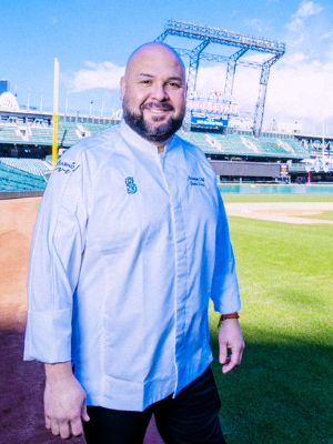 Men at stadium with chef uniform