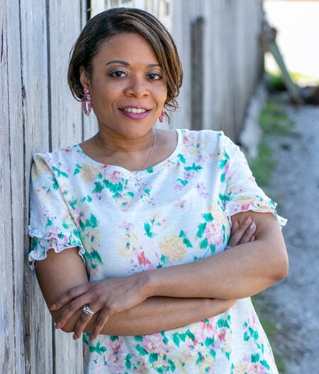Nerissa, Black woman in floral dress