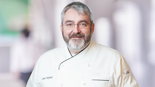 Headshot of Chuck Hatfield, VP of Culinary at Sodexo Campus and Government.