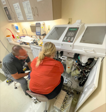 people working in medical machine